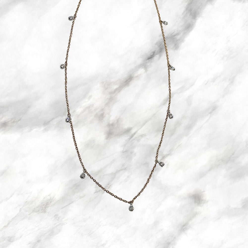 Collana oro rosso 18kt con pendenti in oro bianco e diamanti