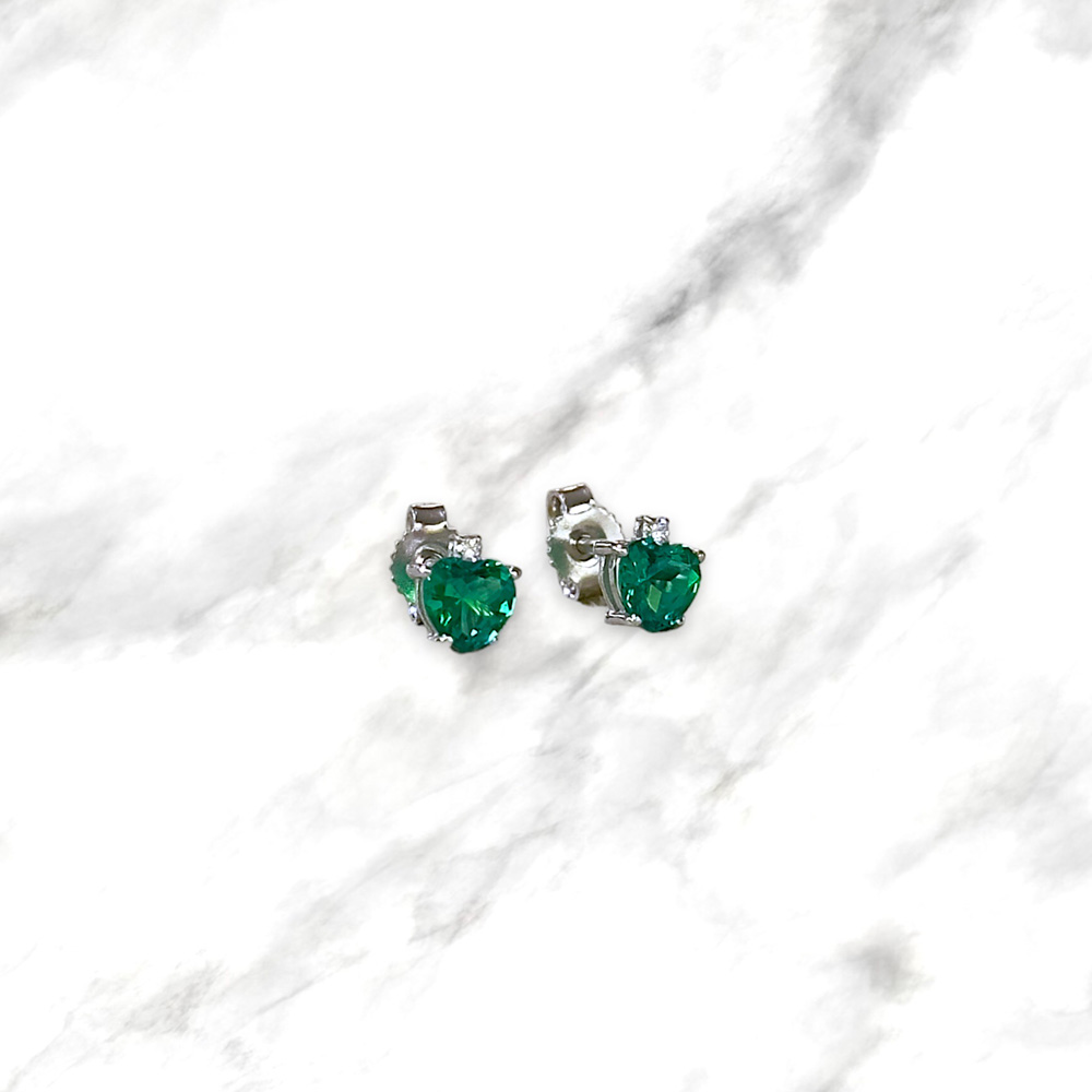 Orecchini in oro bianco con diamanti e smeraldi