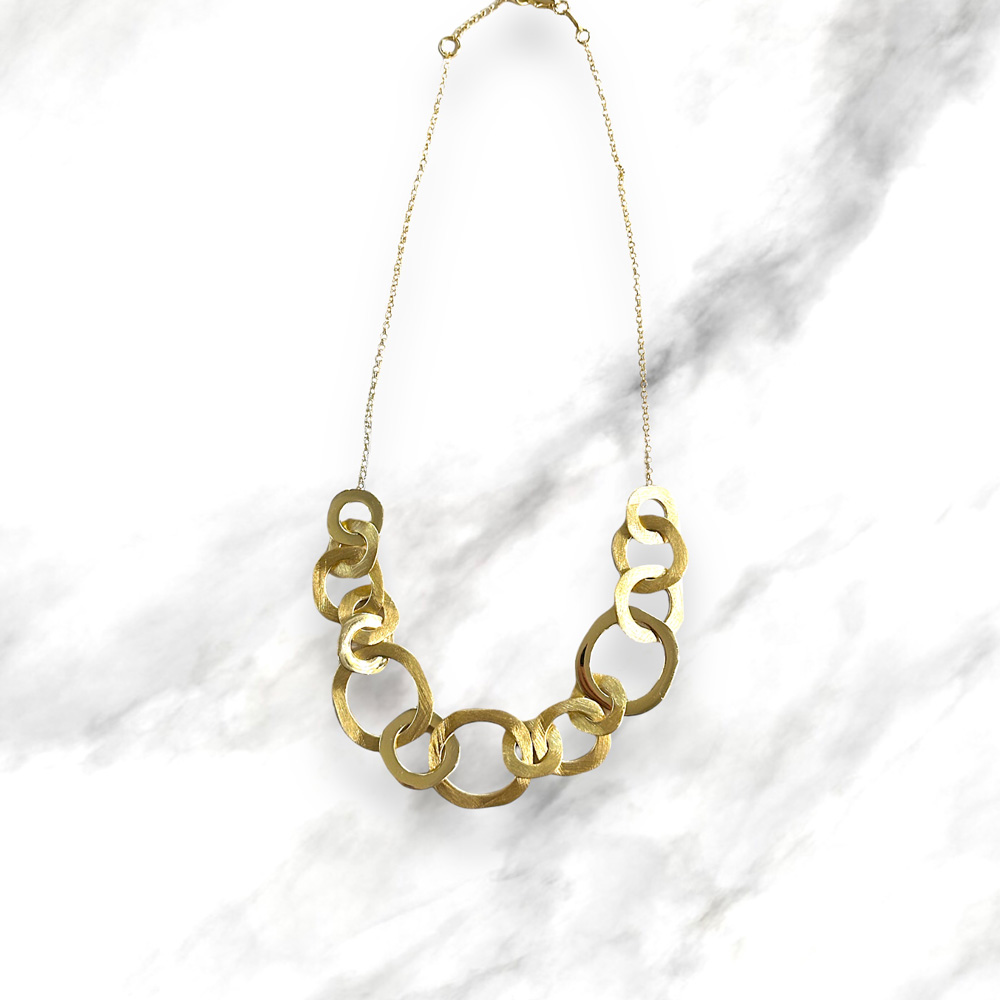 Collana argento dorato con anelli traforati
