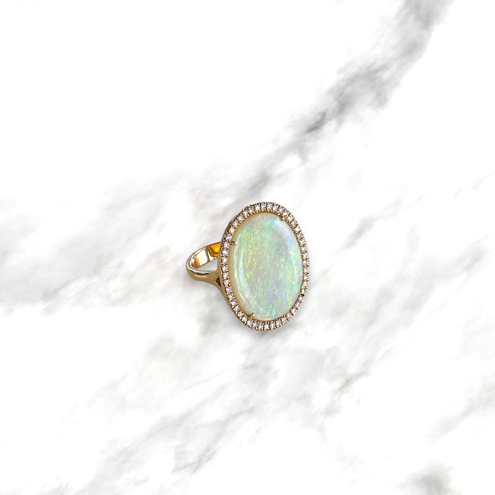 Anello in oro rosso 18kt con opale e diamanti naturali